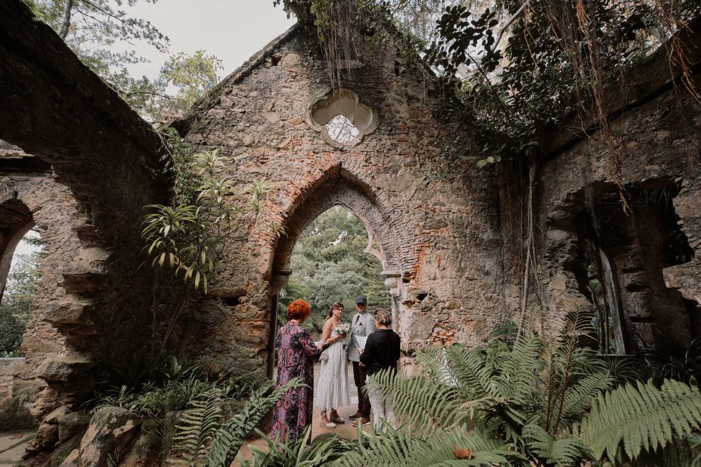 Couple eloping in the ruins of church in Monserrate, Sintra