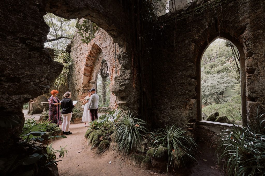 Couple eloping in the ruins of church in Monserrate, Sintra