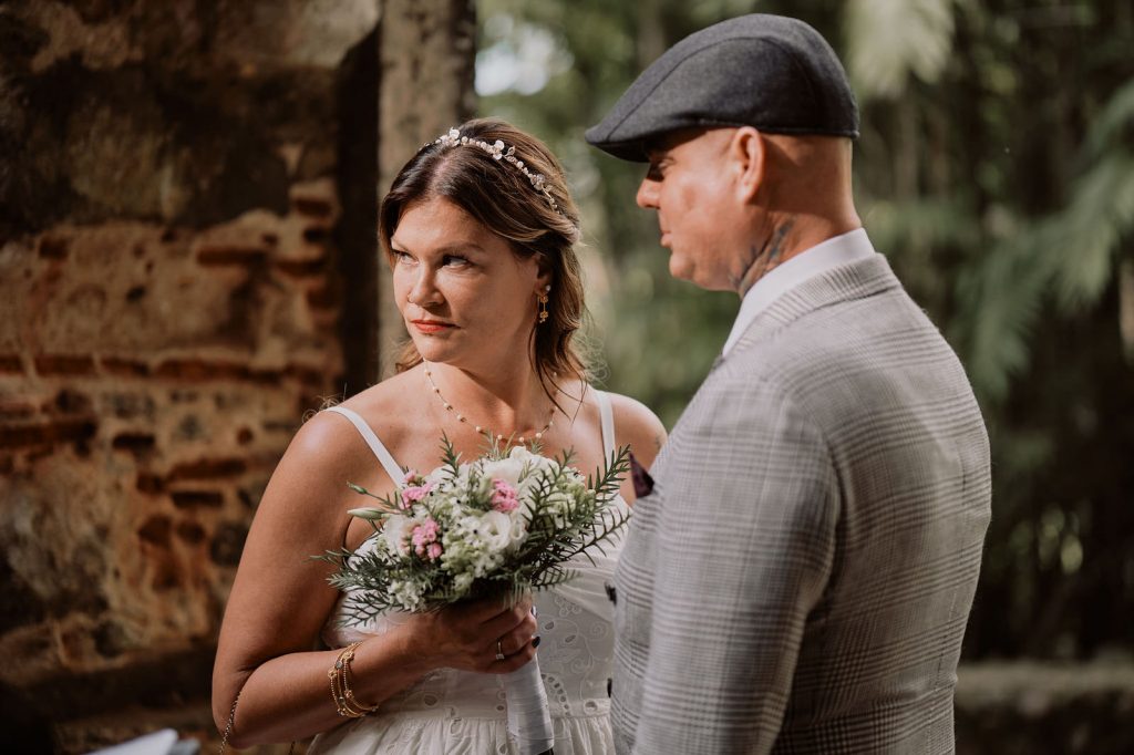 Clouse up of couple eloping in the ruins of church in Monserrate, Sintra