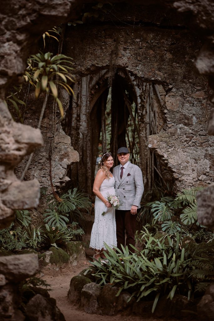 Couple posing in the ruins of church in Monserrate, Sintra
